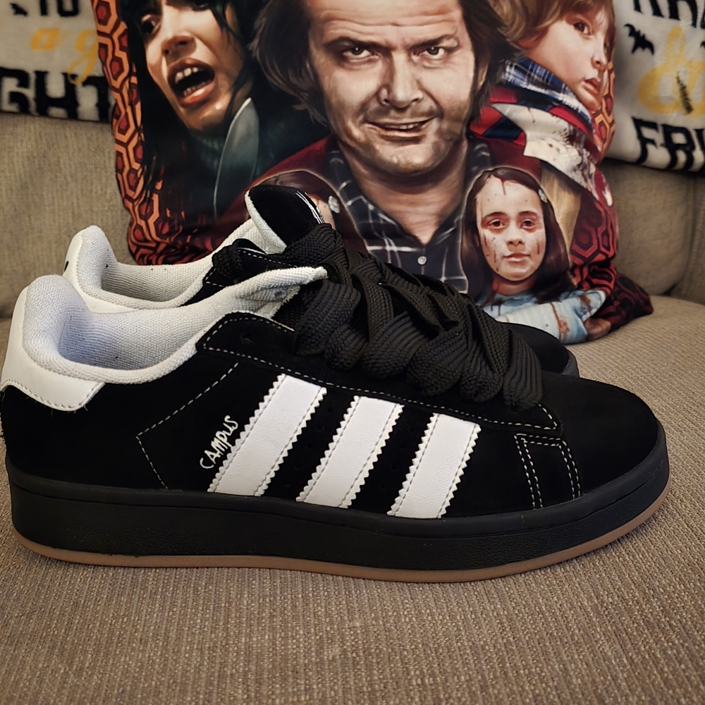 Adidas x KoЯn Campus 00s sneakers in a black, white, and gum colorway.